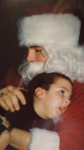 Jason sharing a warm Christmas moment with Santa